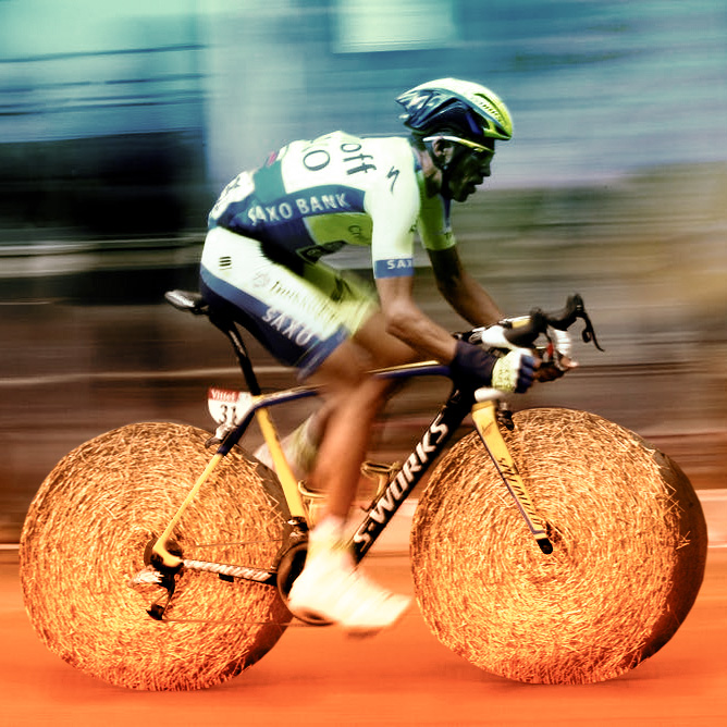 Tour de France cyclist riding a bike with tires made of circular hales of bay.